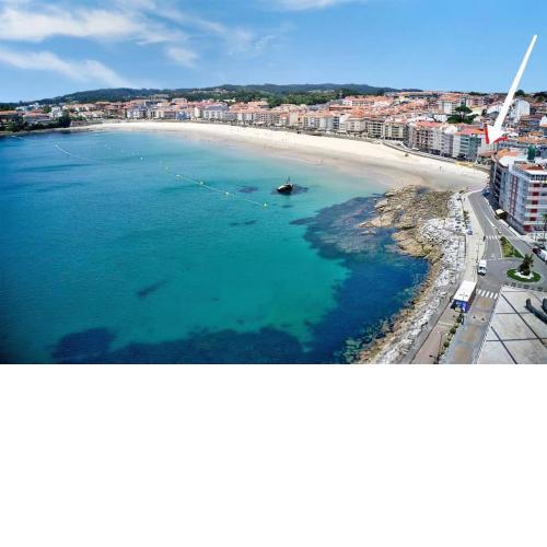 1ª línea paseo-playa de Silgar, portal a 20 pasos