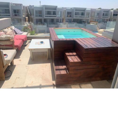 1BR with private Heated Jacuzzi at Sholan Elgouna