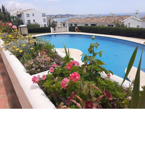 2 Bed Townhouse with garden patio overlooking La Cala Cove & Sea