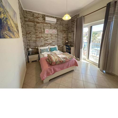 2-Bedroom Blue & White House with Garden and Beach