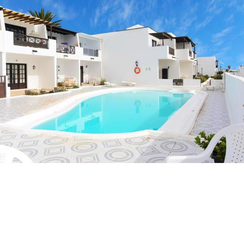 2 bedrooms appartement at Tias 500 m away from the beach with shared pool garden and wifi