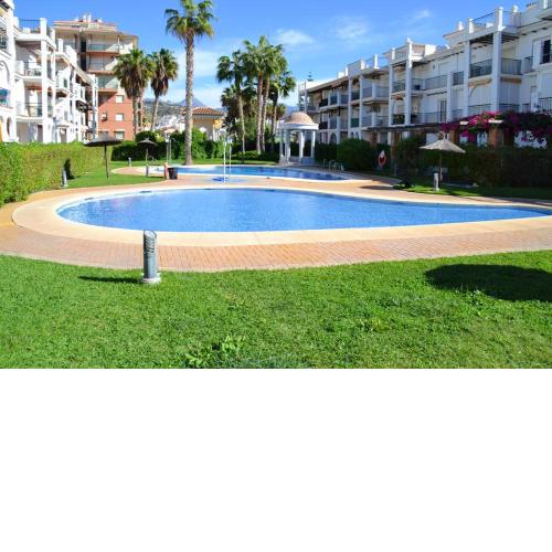 2 bedrooms appartement at Torrox 50 m away from the beach with shared pool enclosed garden and wifi