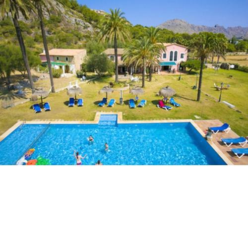 2 bedrooms appartement with shared pool enclosed garden and wifi at Pollenca 1 km away from the beach
