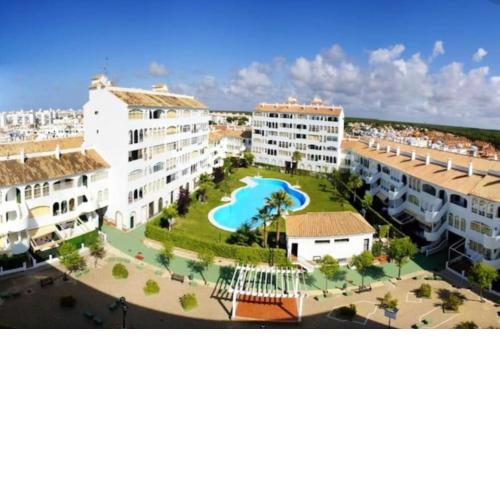 3 bedrooms appartement with city view shared pool and terrace at El Portil 1 km away from the beach