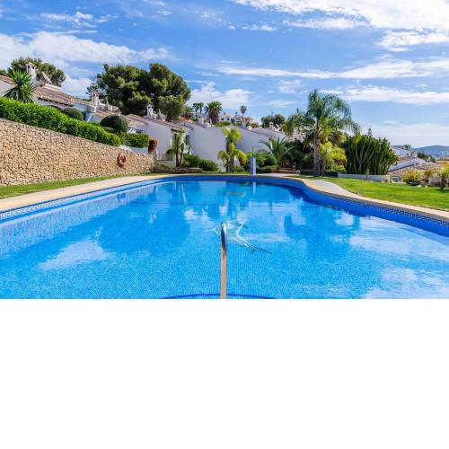 3 bedrooms appartement with shared pool spa and enclosed garden at Teulada 1 km away from the beach
