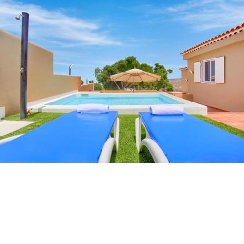 3 bedrooms house with sea view private pool and enclosed garden at Guia de Isora 2 km away from the beach