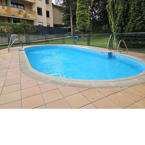 402A Apartamento con garaje y piscina