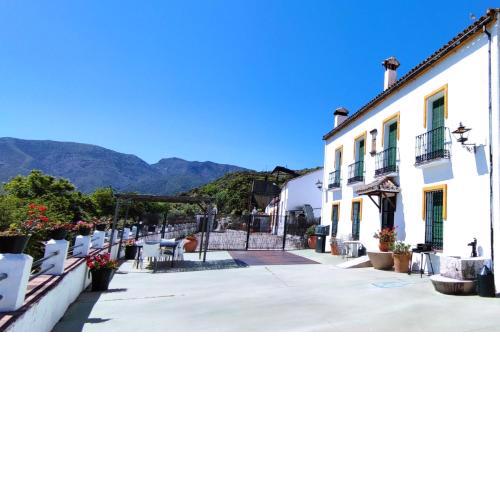 6 bedrooms house with lake view shared pool and enclosed garden at Zahara de la Sierra
