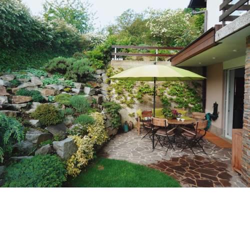 A heartwarming apartment in a house with green surroundings and private garden