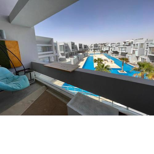 A large Studio with a separated sleeping area overlooking the pool
