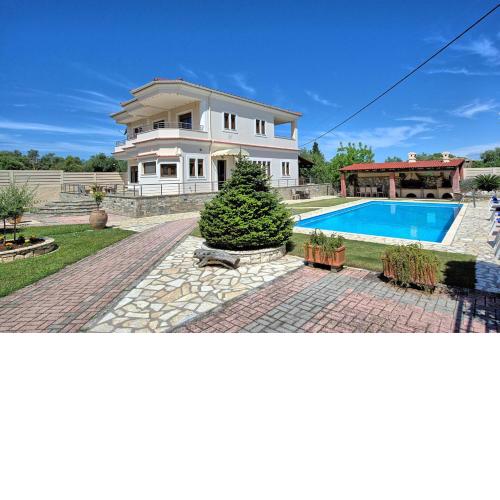 Acharavi Beach Villa by MediterraneanVillas