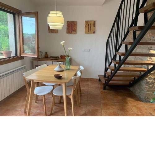 Acogedora casa de invitados con su estilo rustico