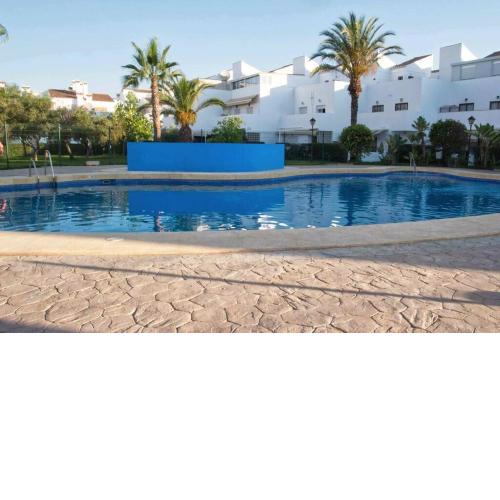 Adosado en playa Vera,3 piscinas