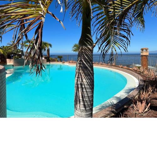 Alzaro SEA and RASCA view with HEATED infinity pool - fully south orientation - BAHIA TROPICAL resort and garden
