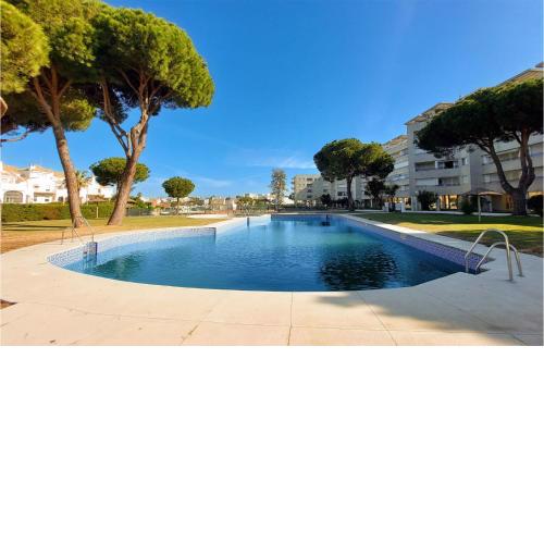 Amazing apartment in El Portil with Outdoor swimming pool, WiFi and 2 Bedrooms