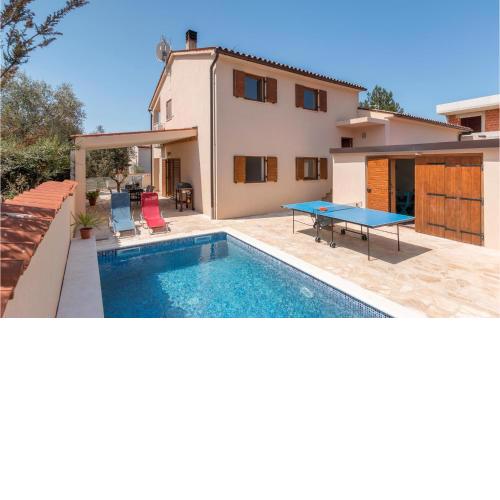 Amazing home in Barbariga with Outdoor swimming pool, WiFi and 5 Bedrooms