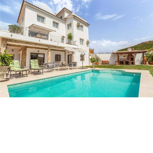 Amazing Home In Mezquitilla With 4 Bedrooms, Outdoor Swimming Pool And Swimming Pool