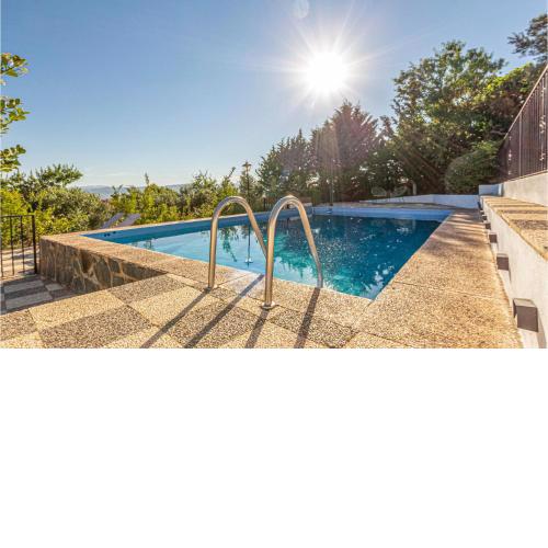 Amazing home in Nigelas with 4 Bedrooms, WiFi and Outdoor swimming pool