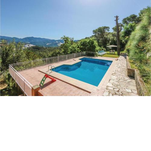 Amazing home in St Cebria de Vallalta with 4 Bedrooms, WiFi and Outdoor swimming pool