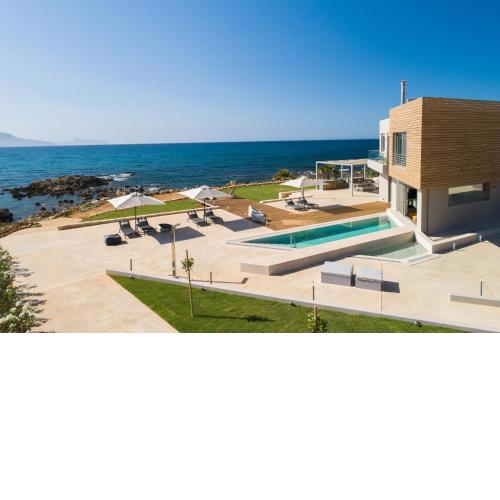 An intimate Villa Resort- Right on the beach, by ThinkVilla