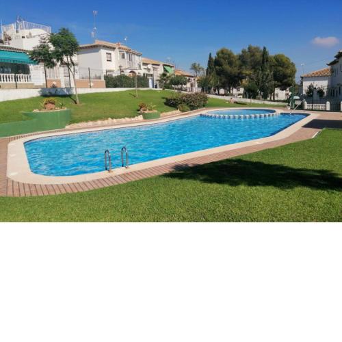 Apartament Casa del Gato Rojo , communal swimming pool , terrace with barbecue