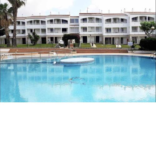 Apartamento bajo con piscina Macarella