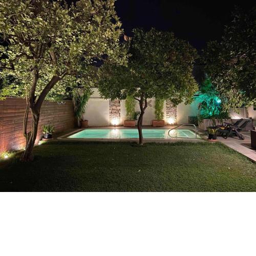 Apartamento Bizcocheros con piscina y jardín privado