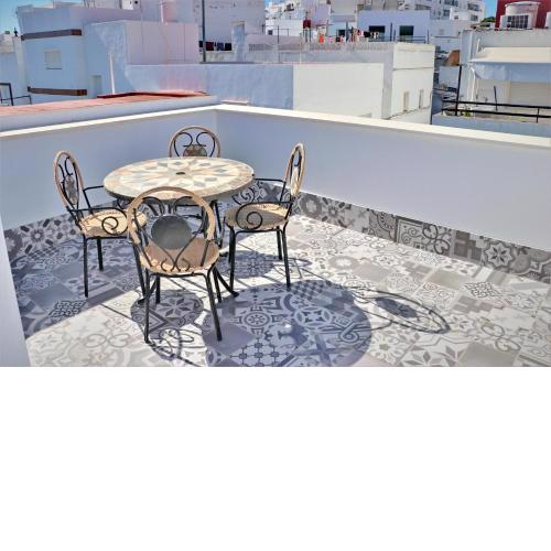 Apartamento con azotea privada