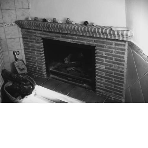 Apartamento con chimenea