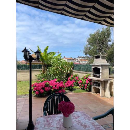 apartamento con jardín privado y barbacoa a 5 min playas santander