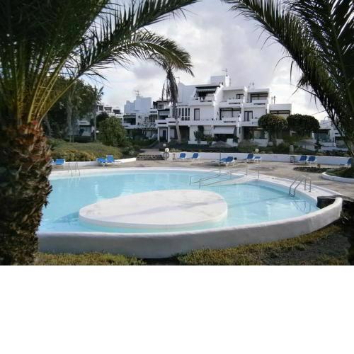Apartamento con jardín
