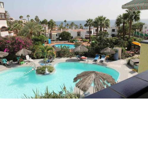 Apartamento con piscina climatizada y vista al mar
