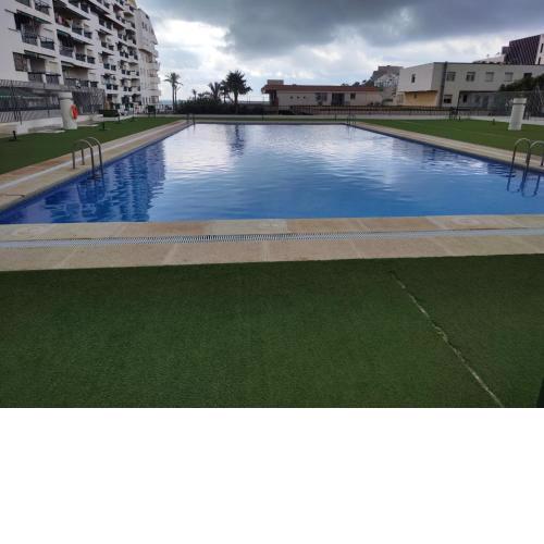 Apartamento con piscina comunitaria y terraza