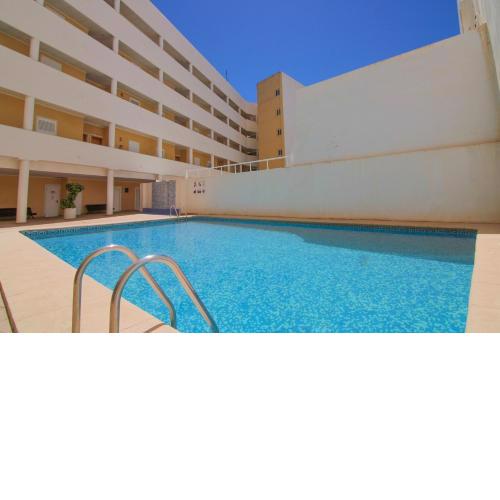 Apartamento con piscina en el centro de Calpe - PUEBLOMAR