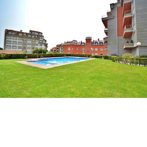 Apartamento con piscina en el centro de Sanxenxo