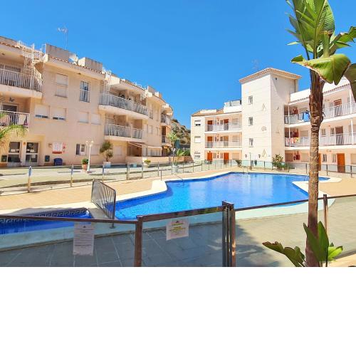 Apartamento con Piscina, Wifi y Jardín con Barbacoa