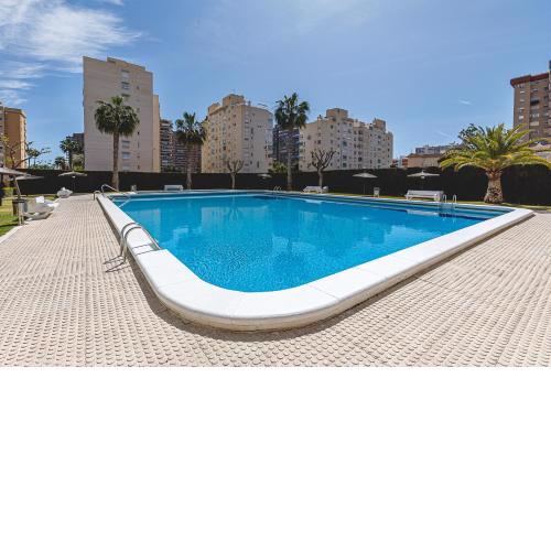 Apartamento con piscina y parking - Playa San Juan