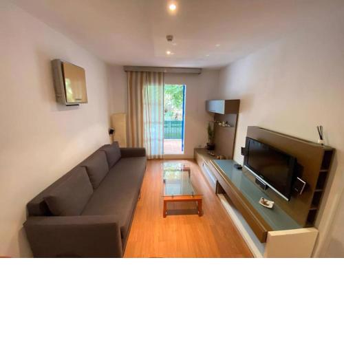 Apartamento en la Jara, playa, piscina y jardín.