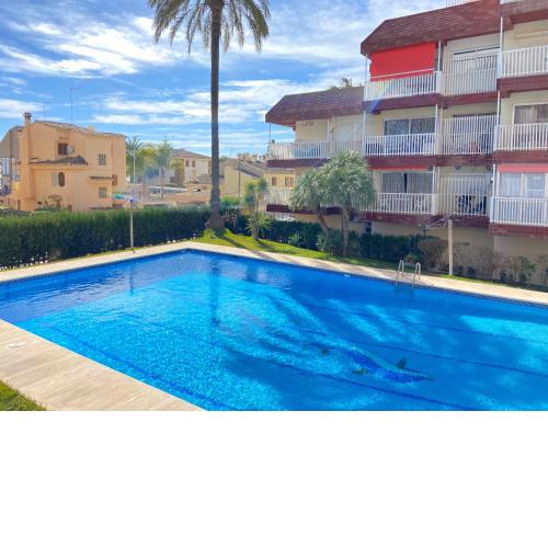 Apartamento en la Playa con WiFi rápido, piscina y SmartTV