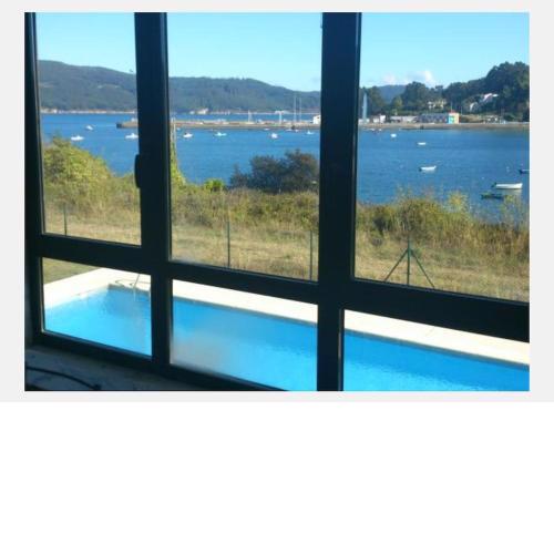 Apartamento encima del mar, piscina y terraza