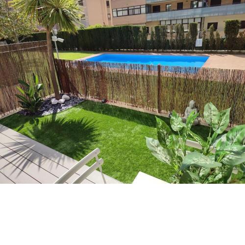 Apartamento familiar con jardín y piscina en Salou