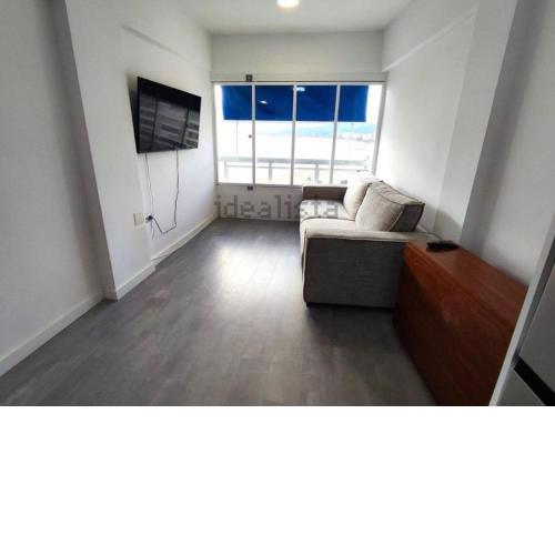 Apartamento frente al mar con piscina y garaje