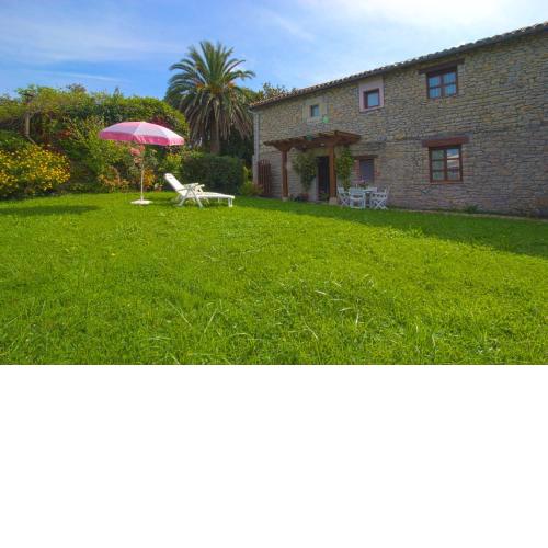 Apartamento La Ermita con jardín