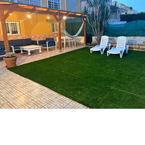 Apartamento playa Oliva con piscina y terraza compartida con los propietarios