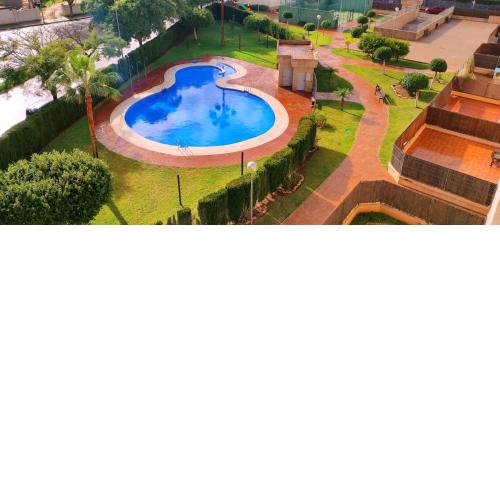 Apartamento TomCar Piscina, Pádel, wifi y zonas comunes