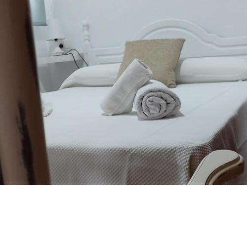 Apartamentos Bolonia - M a n u e l a