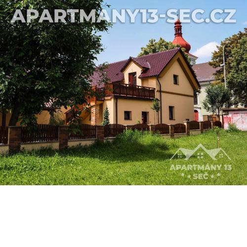 Apartmanový dům 13 Podkroví 1