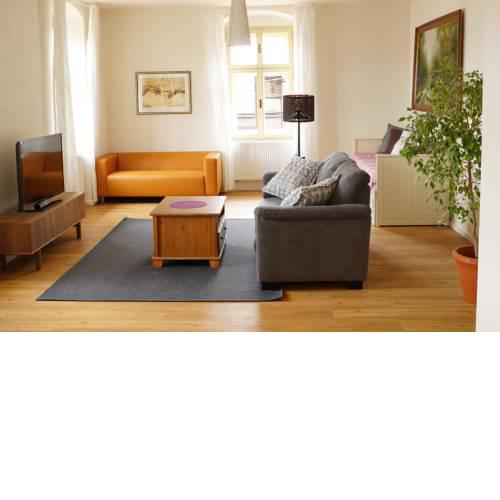 Apartmány u komína