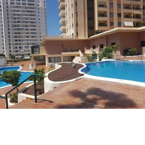 Apartment with balcony and pools in Playa Paraiso