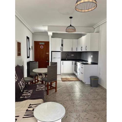 Apartment with Outdoor Pool and Air Conditioning in Cabo Roig